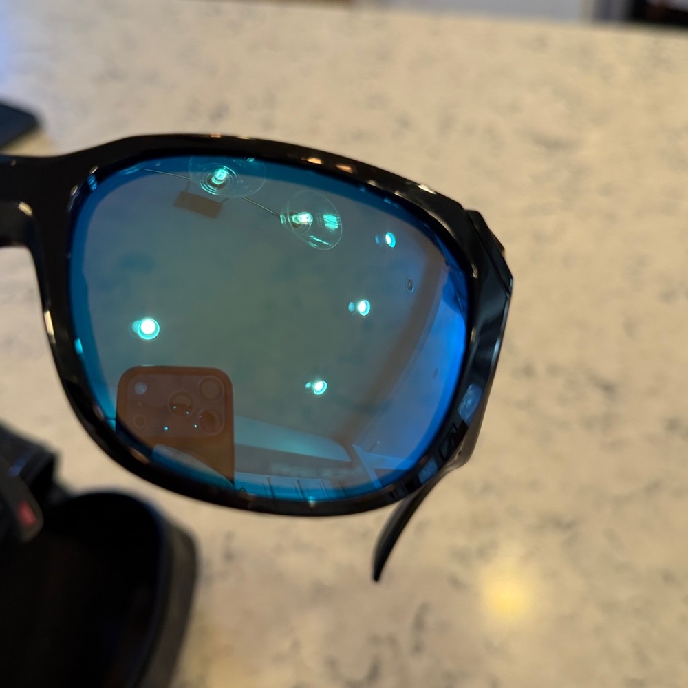 Blue Mirrored Lens Oakley Sunglasses with Black Frame - Picture 7 of 8